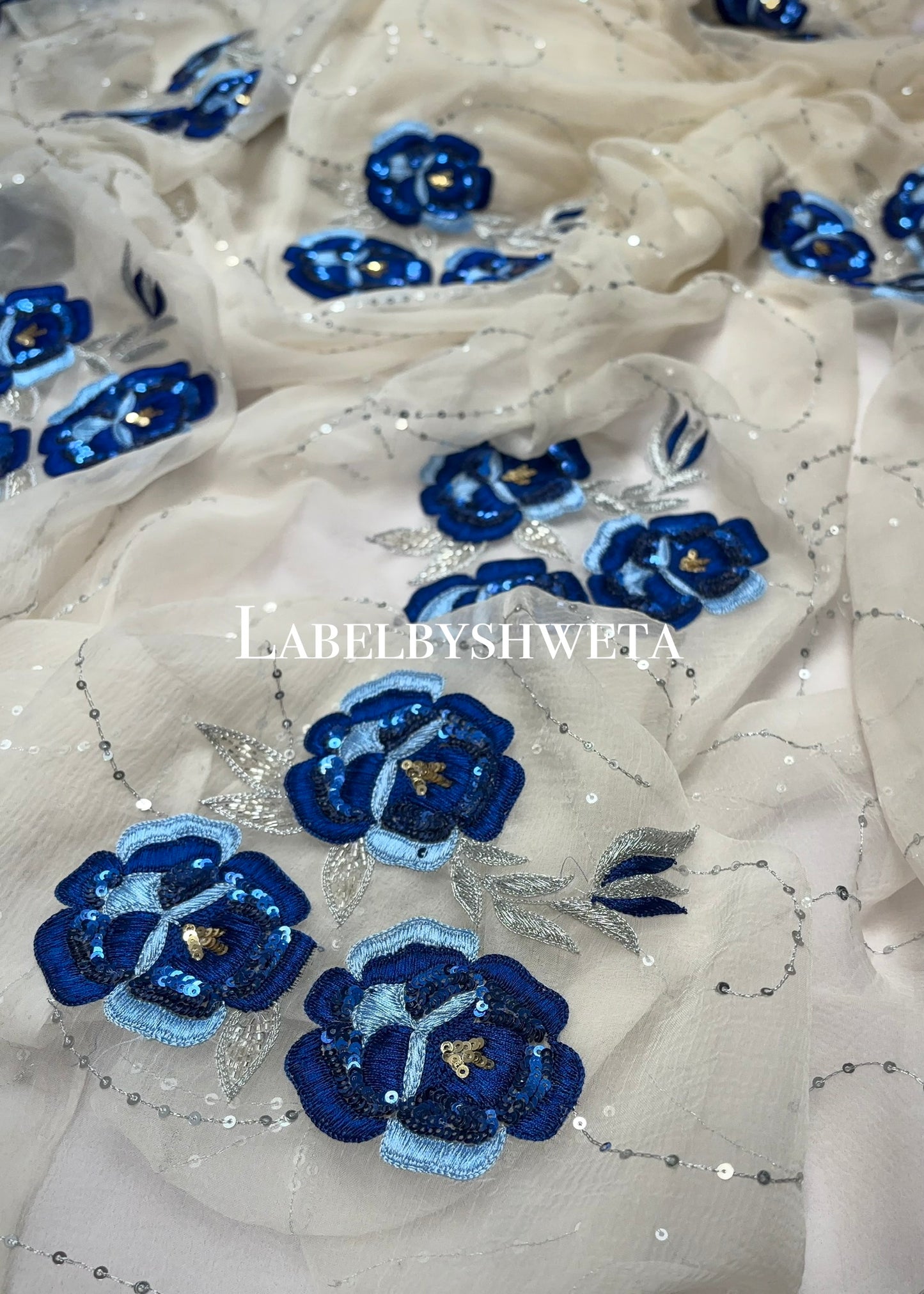 Off-White Double Diamond Chiffon Saree | 3D Navy Blue Rose Embroidery with Sequin & Silver Zari Work