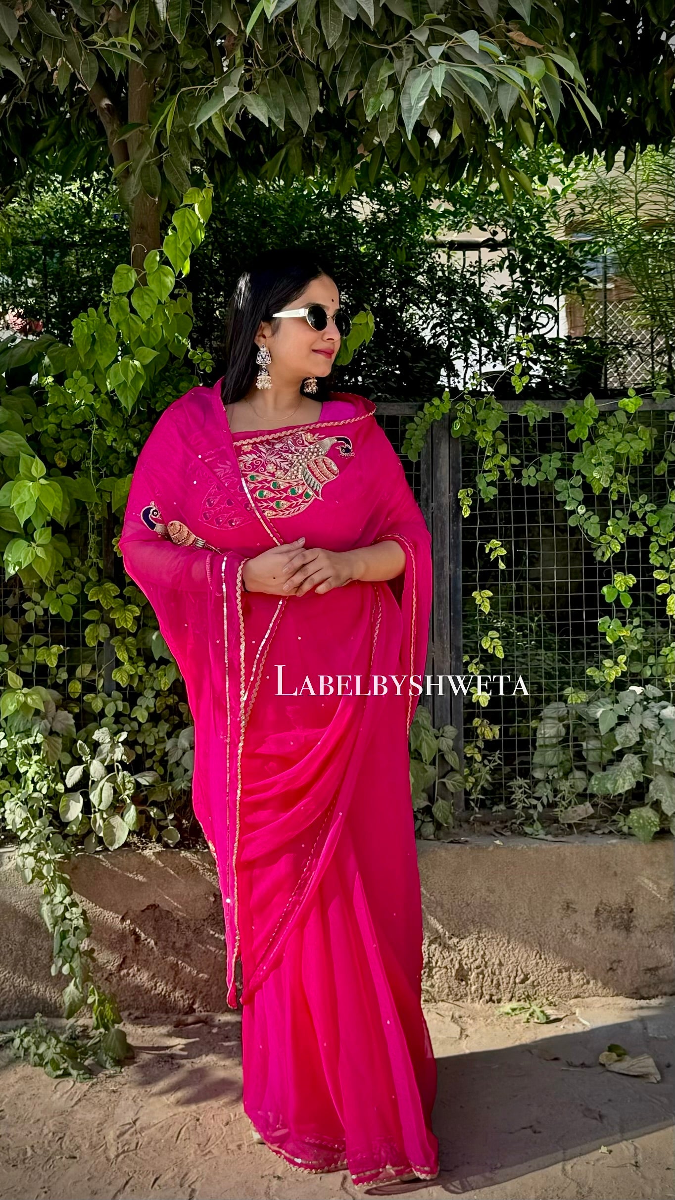 Rani pink Single Diamond chiffon saree with Peacock Motifs and Statement Shoulder Embroidery