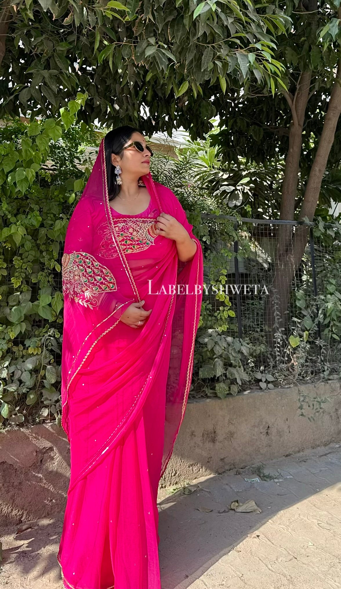 Rani pink Single Diamond chiffon saree with Peacock Motifs and Statement Shoulder Embroidery